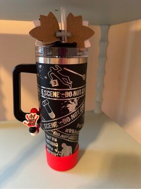 Stanley Black Crime Scene Pattern Insulated Travel Tumbler with Red Base,